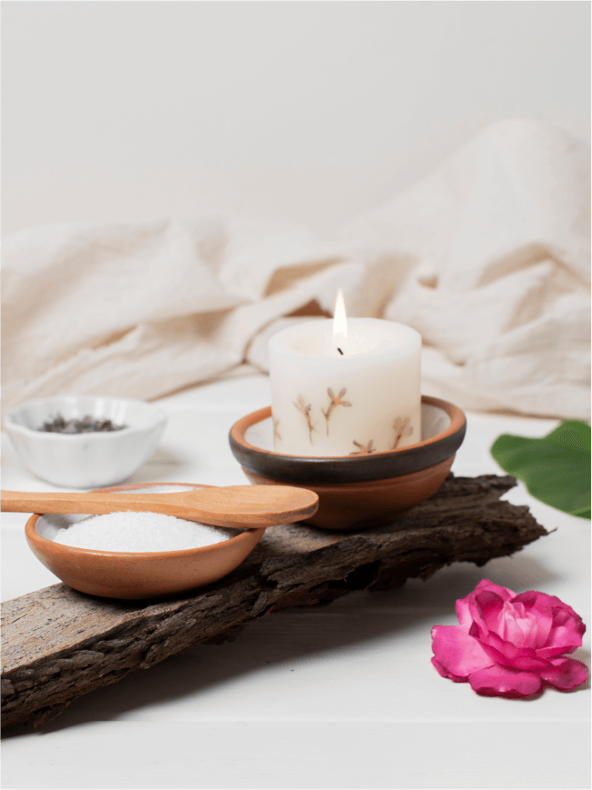 Calm spa treatment still life with towels and candles